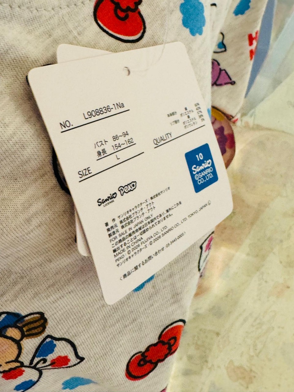 ...2026 Peko x Sanrio T-Shirt (size L)