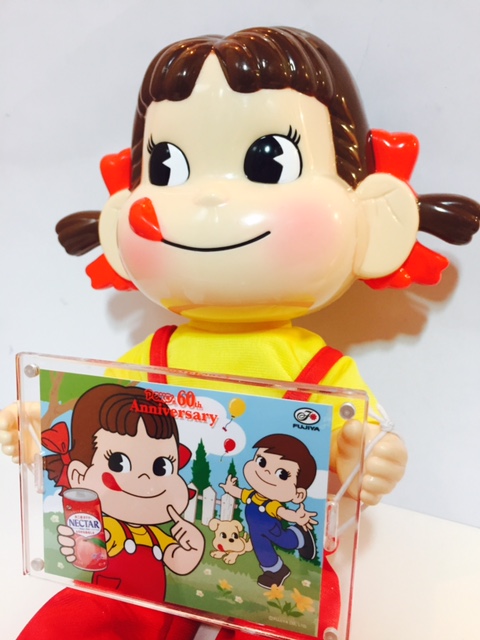 2010 首振Peko人形連相框